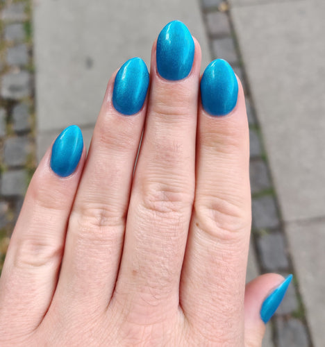 Ship-Notized blue nail polish CND
