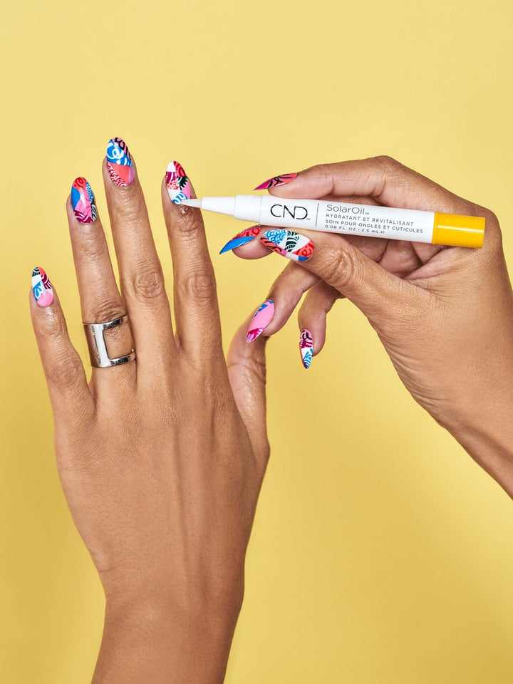 Using CND Solar Oil Pen over pretty nail polish