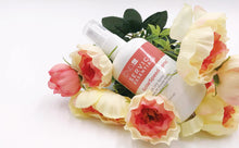Load image into Gallery viewer, CND Solarspeed Spray bottle in among flowers
