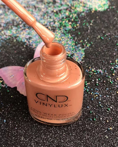 Spear = light terracotta nails from CND Vinylux