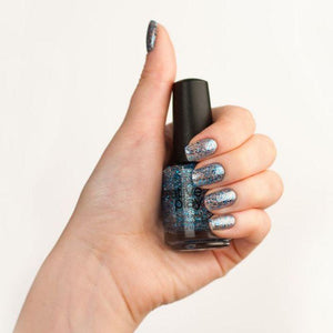 Kiss & Teal blue glitter nail polish CND